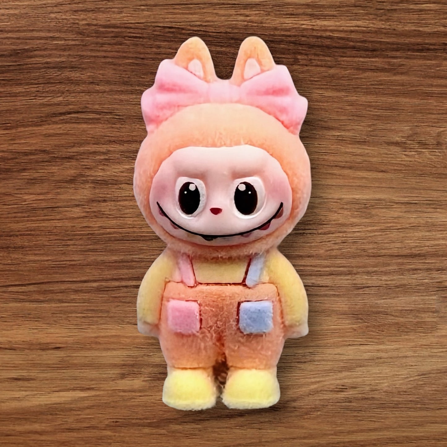 Flocked Monster With Bow Bead