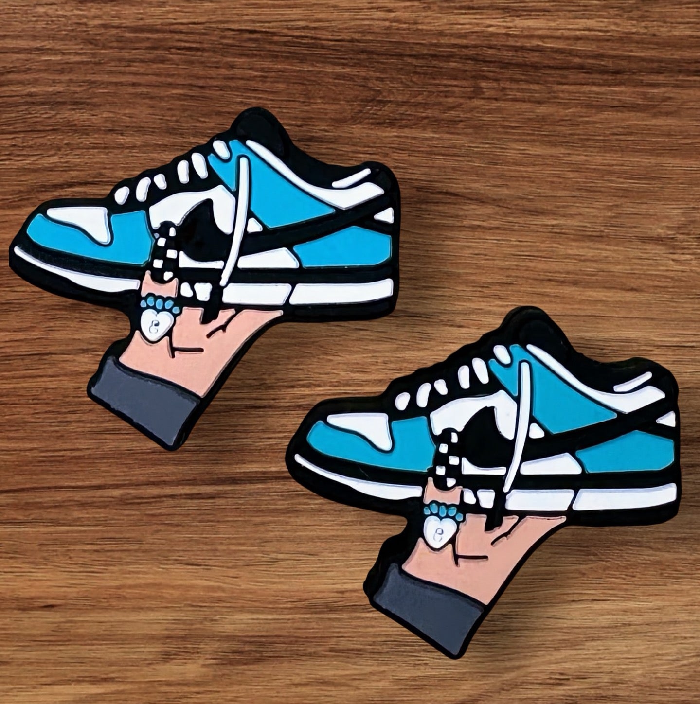 Hand Holding Shoe Focal