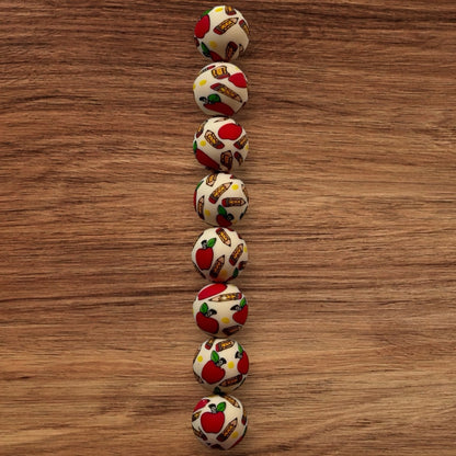 15mm Pencils & Apples Silicone Bead (Off White)